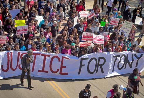 Marching against the decision not to charge a Madison police officer for killing Tony Robinson