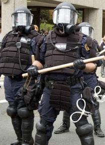 Police dressed in riot gear