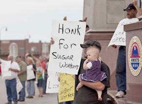 Locked-out workers rally for support outside an American Crystal Sugar facility